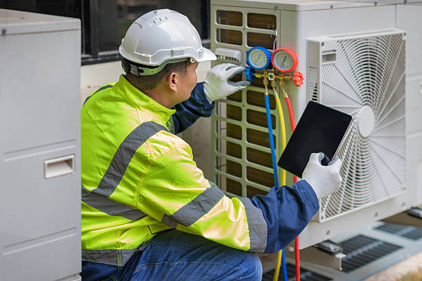Professional Air Conditioning Repair technician working in Comfort, TX